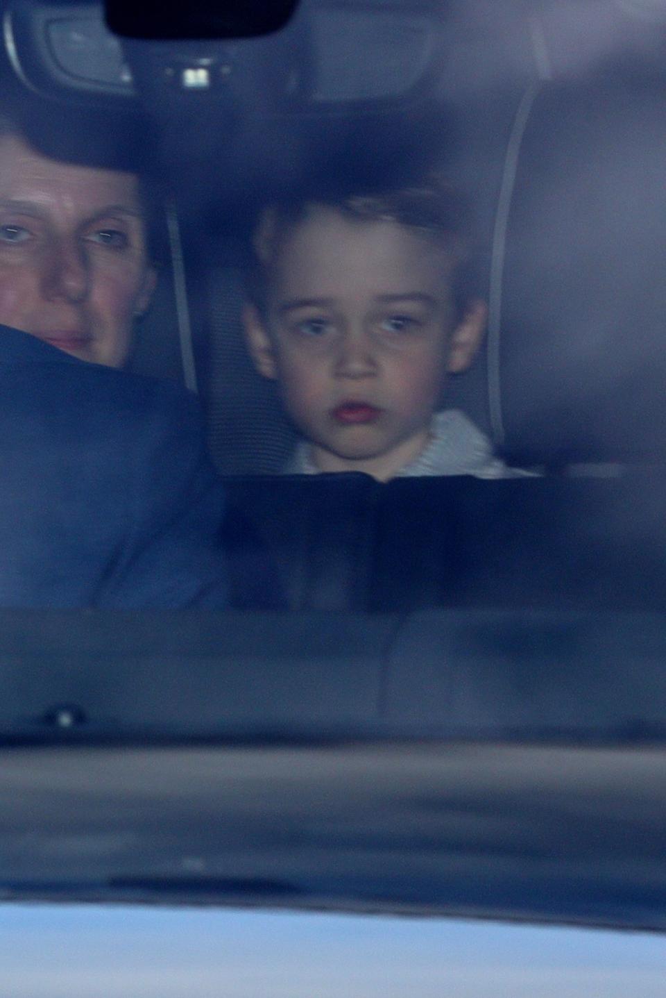 Prince George was pictured in the car with the Duke and Duchess of Cambridge (PA)