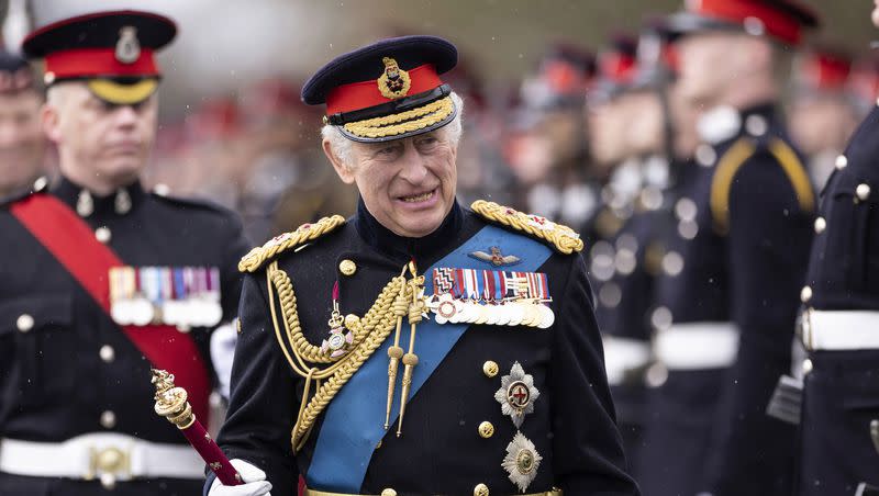 Britain’s King Charles III inspects the 200th Royal Military Academy Sandhurst Sovereign’s Parade and presents the new Colours and Sovereign’s Banner to the receiving Ensigns in Camberley, England, Friday, April 14, 2023.