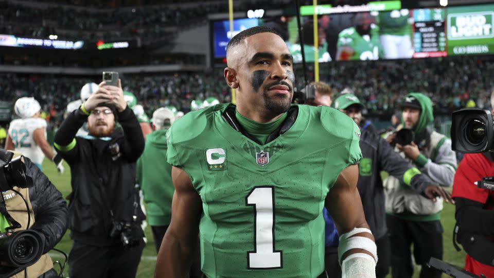 Hurts leaves the field after defeating the Dolphins. - Tim Nwachukwu/Getty Images