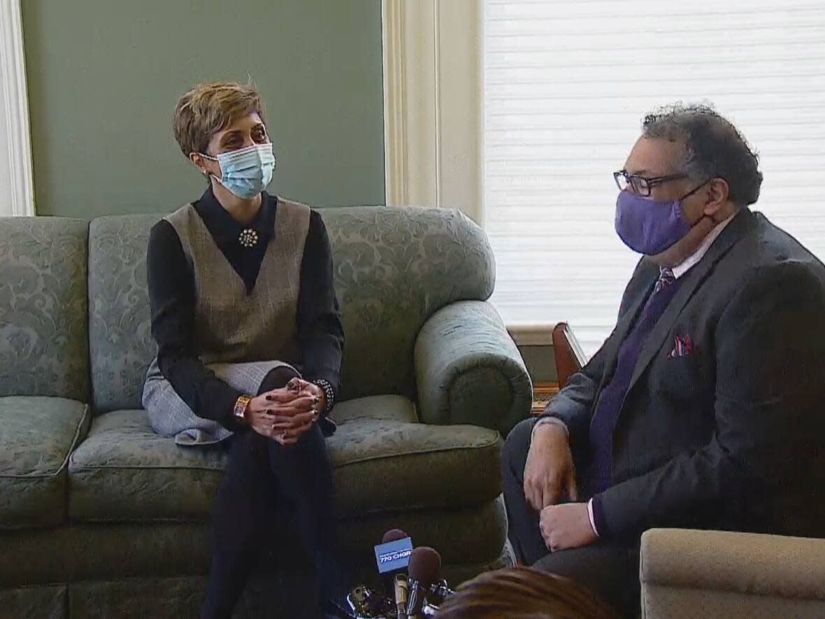 Calgary's mayor-elect Jyoti Gondek, left, and outgoing Mayor Naheed Nenshi met on Tuesday. (Mike Symington/CBC - image credit)