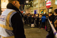 <p>Crowds are held back by police cordons two blocks from the Oxford Circus on Nov. 24, 2017 in London, England. (Photo: Paul Davey/Barcroft Media via Getty Images) </p>