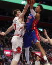 Detroit Pistons forward Christian Wood (35) attempts to shoot as Chicago Bulls forward Luke Kornet (2) defends during the first half of an NBA basketball game, Saturday, Jan. 11, 2020, in Detroit. (AP Photo/Carlos Osorio)