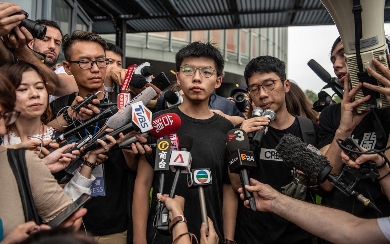 Joshua Wong speaks to the media shortly after being released from prison - Getty Images AsiaPac