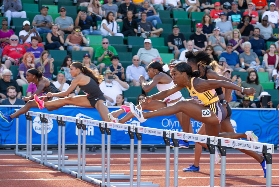Keni Harrison, far right, and LoLo Jones raced in Heat 4 of the women's 100-meter hurdles Friday at the U.S. track and field trials.