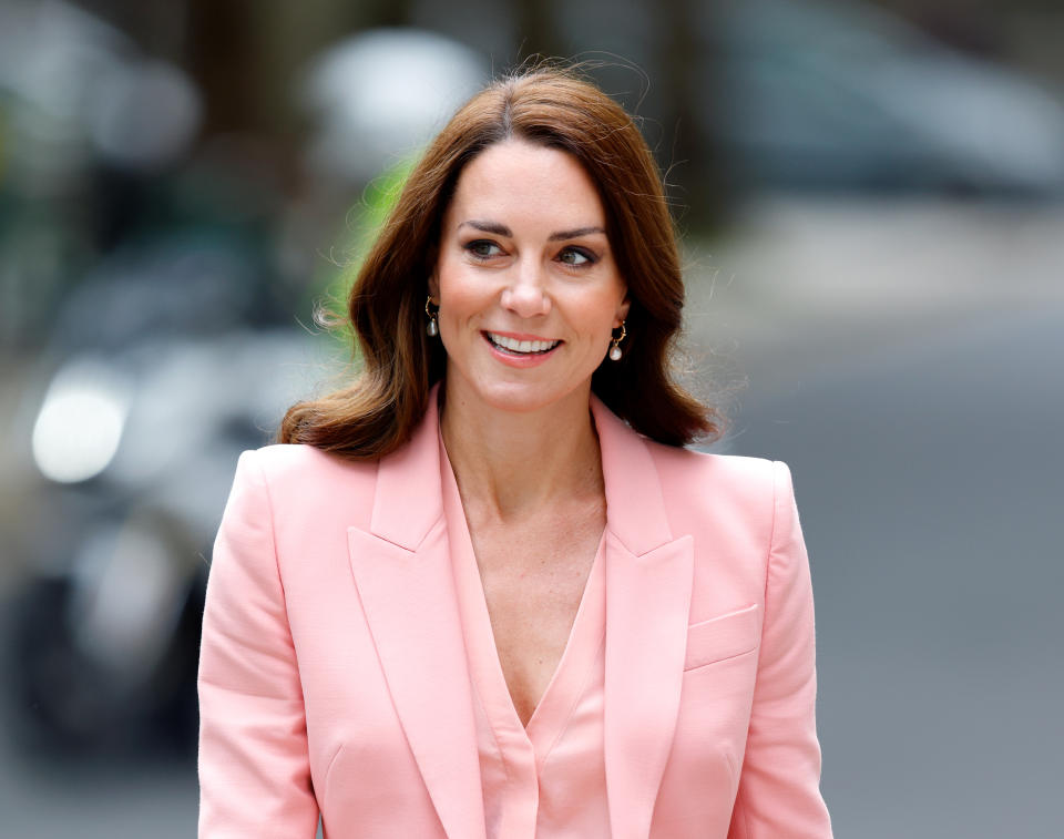 Kate Middleton in a pink dress and blazer.