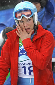 Julia Mancuso reacts as she leaves the finish area after finishing her first run of the giant slalom