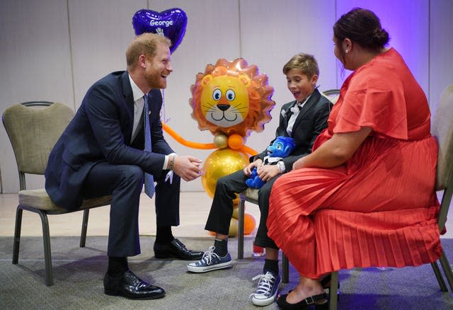 The Duke of Sussex speaking to George Hall and his mother 