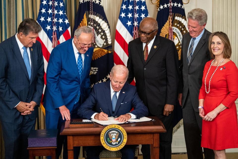 President Joe Biden signs the Inflation Reduction Act into law at the White House last month.