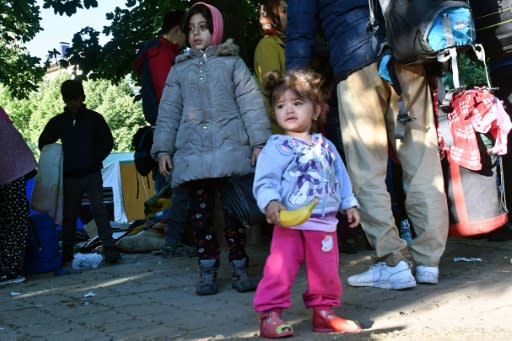 Young children were among the migrants evacuated from a makeshift camp in Sarajevo