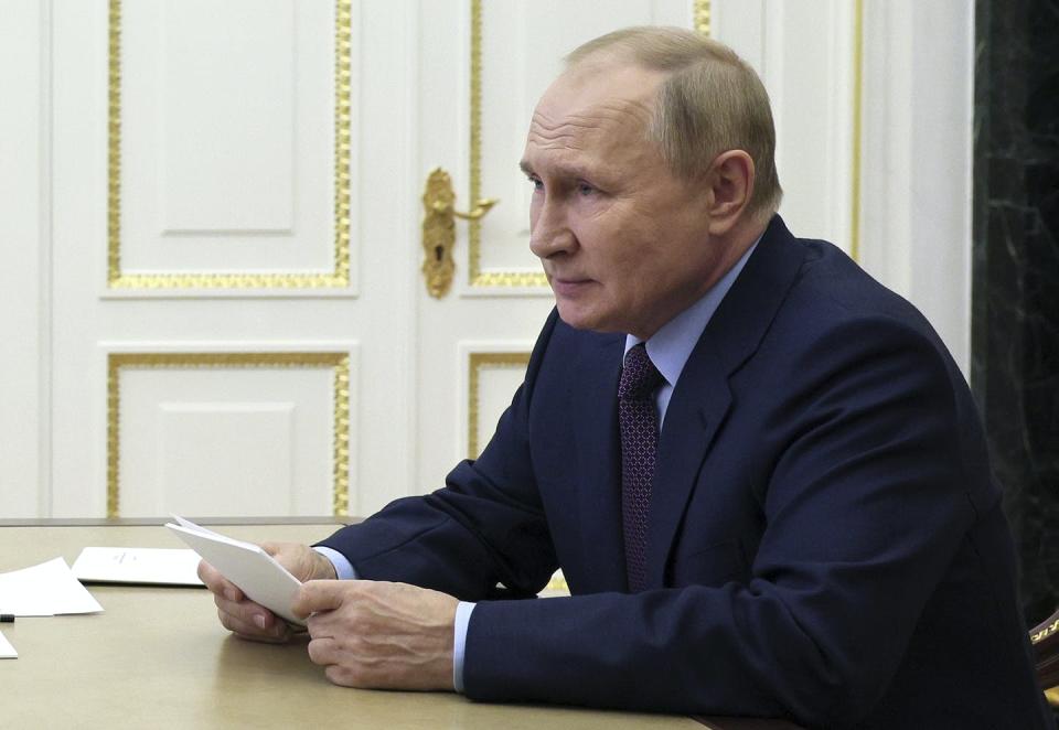 Russian President Vladimir Putin chairs a meeting on economic issues via teleconference call in Moscow on Sept. 12, 2022. (Gavriil Grigorov, Sputnik, Kremlin Pool Photo via AP)