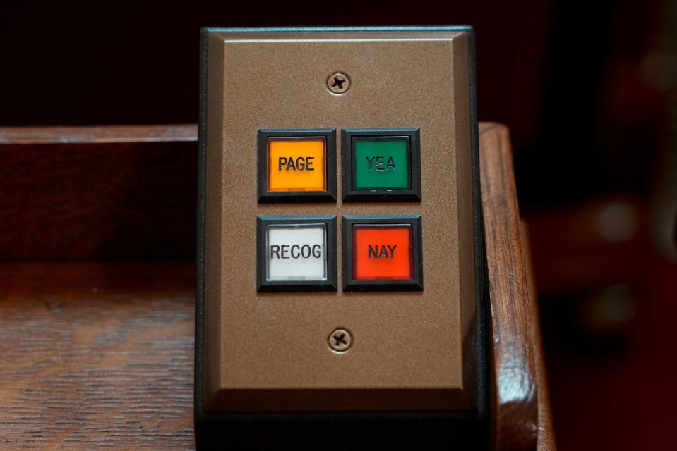 Voting and call buttons in the Rhode Island House chamber.