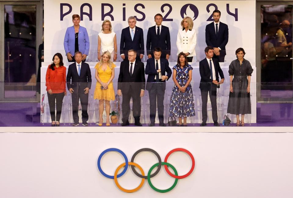 (L-R) Thomas Bach, President of International Olympic Committee, Emmanuel Macron, President of France, Brigitte Macron, wife of French President Emmanuel Macron, and Tony Estanguet, President of the Paris Organising Committee for the 2024 Olympic and Paralympic Games, are seen alongside members of the International Olympic Committee (IOC) at the closing ceremony of the 2024 Paris Olympics on Aug. 11.