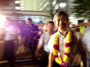 Aljunied MP Chen Show Mao greets party supporters at the rally grounds. (Yahoo! photo)