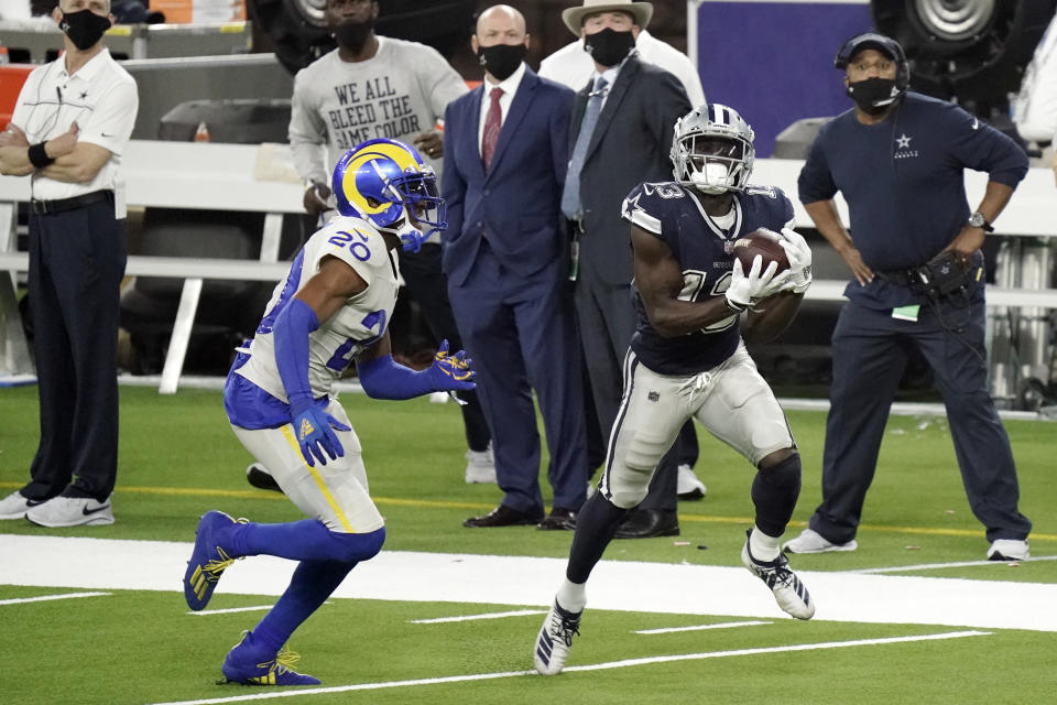 Dallas Cowboys wide receiver Michael Gallup (13) makes a catch but it was called for offensive pass interference. (AP Photo/Jae C. Hong)