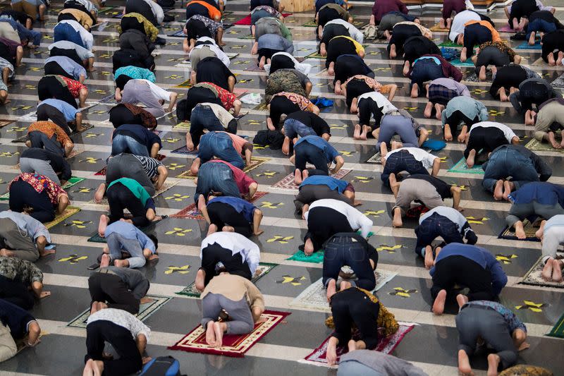 Indonesia Muslims take part in Friday prayers at a mosque, amid the spread of coronavirus disease (COVID-19) outbreak, in Bandung