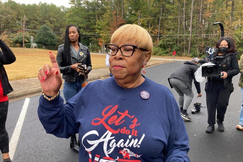 Helen Butler, executive director of The Georgia Coalition for the People’s Agenda, speaks to organizers at a Black church tradition event known as “Souls to the Polls” in Decatur, Ga., Sunday, Oct. 30, 2022.