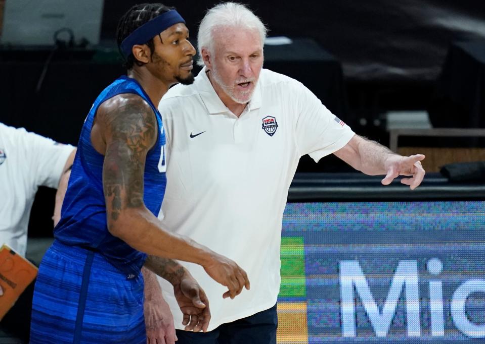 Team USA coach Gregg Popovich speaks with Bradley Beal during Monday night's Olympic tune-up loss to Australia.