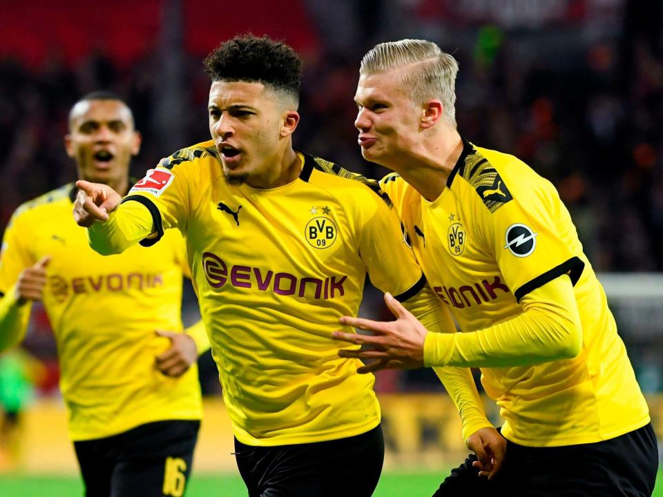 Dortmund's Jadon Sancho and Erling Braut Haaland: AFP via Getty Images