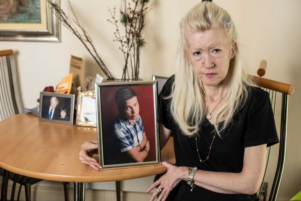 Jasna Badzak with a picture of her son Sven, who was stabbed to death near his home in February (Daniel Hambury/Stella Pictures Ltd)