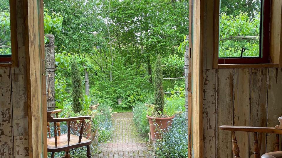 Monty Don's summer house, lined with recycled tongue and groove boards