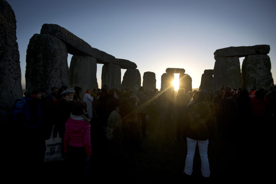 Revelers celebrate the pagan festival of 'Winter Solstice' at Stonehenge in Wiltshire in southern England on December 21, 2012. (BEN STANSALL/AFP/Getty Images)