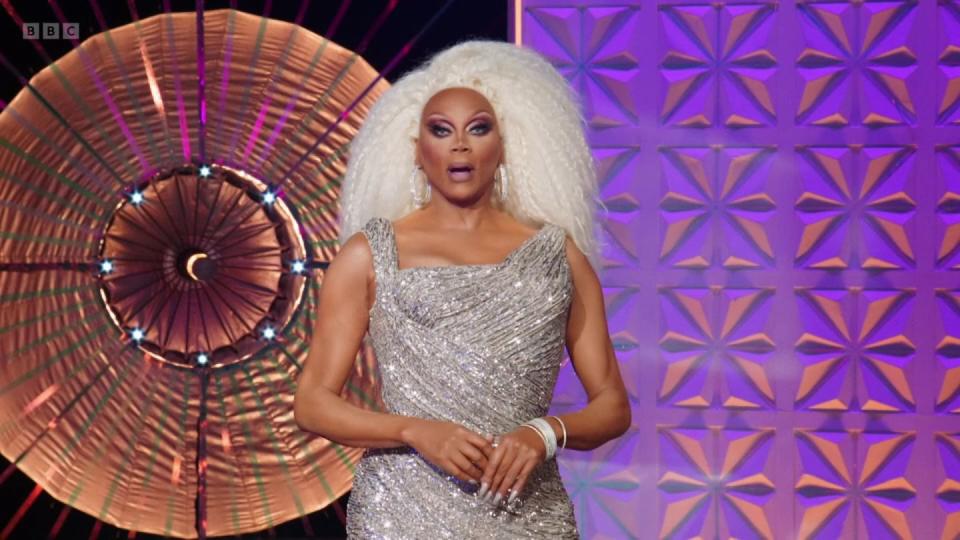 rupaul's drag race uk series 5 episode 3, ru in a silver dress and big off white wig