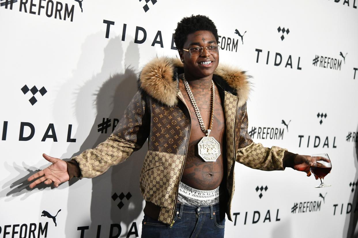 Rapper Kodak Black is offering to pay college tuition for the kids of two fatally shot Florida FBI agents.