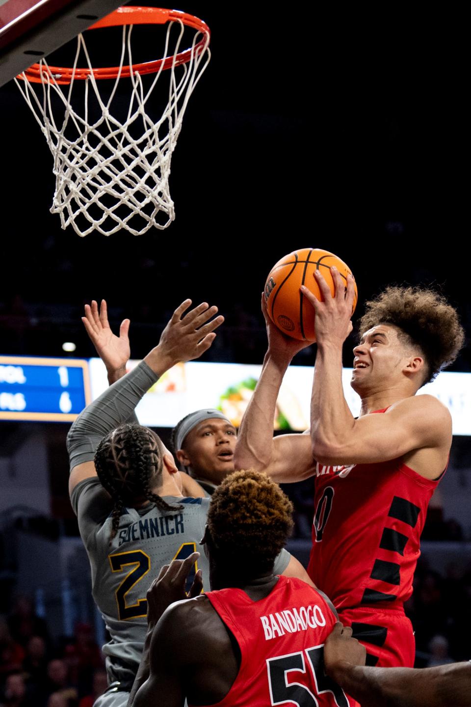 Bearcats guard Dan Skillings Jr. scored 17 points in UC's 92-56 victory over West Virginia  Saturday. Tuesday, the squads will square off for a third time, this time in the Big 12 tournament.