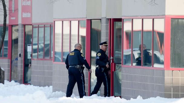 PHOTO: Law enforcement officers enter the Starts Right Here building, Jan. 23, 2023, in Des Moines, Iowa. Police say two students were killed and a teacher was injured in a shooting at the Des Moines school on the edge of the city's downtown. (Charlie Neibergall/AP)