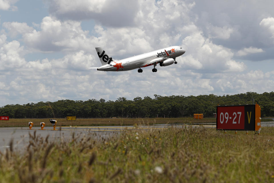 Pictured is a Jetstar plane taking off near the location of Melbourne airport's new runway, in Melbourne, Monday, January 31, 2022. 