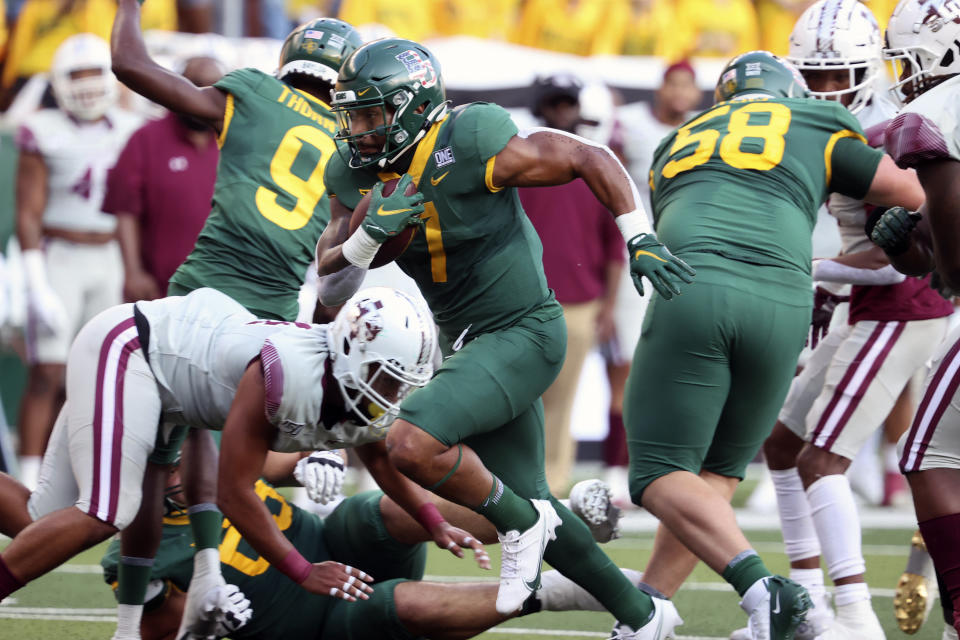 Baylor running back Abram Smith scores against Texas Southern in the first half of an NCAA college football game, Saturday, Sept. 11, 2021, in Waco, Texas. (Rod Aydelotte/Waco Tribune-Herald via AP)