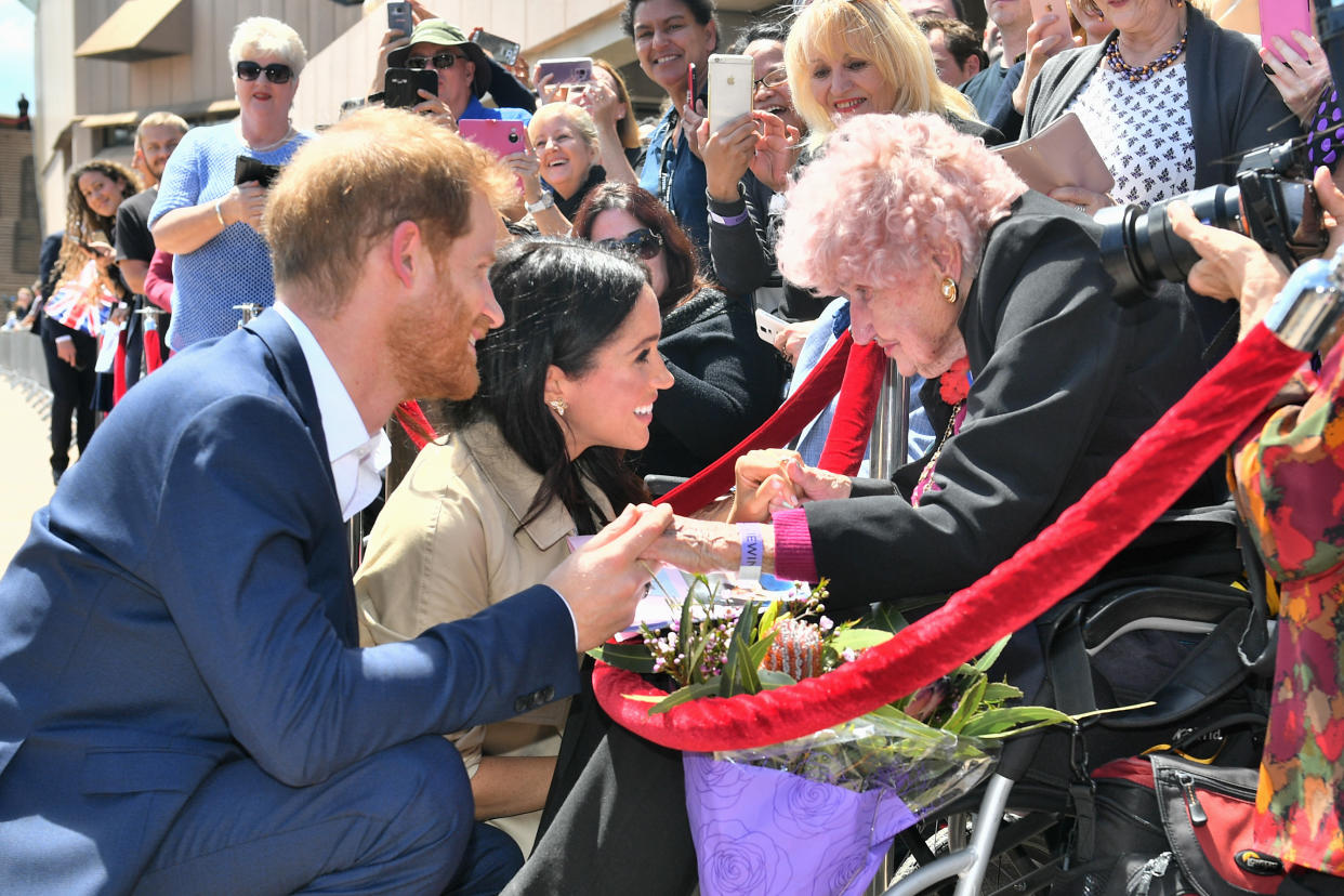 Meghan Markle meets Daphne Dunne, a superfan of Prince Harry’s. (Photo: Getty Images)