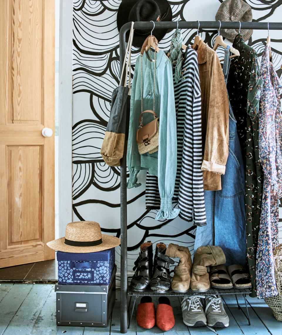 Add a clothes rail for pretty and practical storage