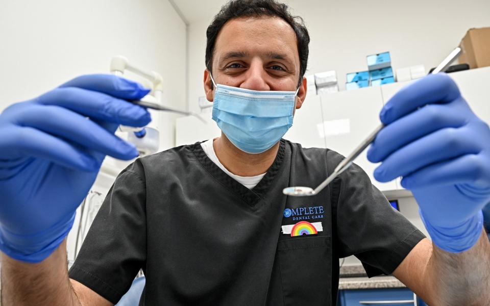 GLASGOW, SCOTLAND - MARCH 30: Scottish Labour leader Anas Sarwar poses during a visit to Complete Dental Care while campaigning for the Scottish Parliamentary election on March 30, 2021 in Glasgow, Scotland. Mr Sarwar started his working life for the NHS as a dentist, visited the surgery this morning ahead of the first campaign televised leaders debate to discuss Labour's plan for an NHS recovery. - Jeff J Mitchell/Getty Images