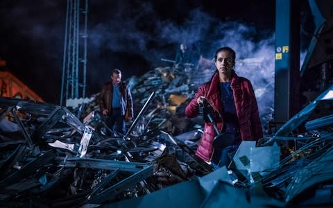 Graham (Bradley Walsh) and Yaz (Mandip Gill) search for parts - Credit: BBC
