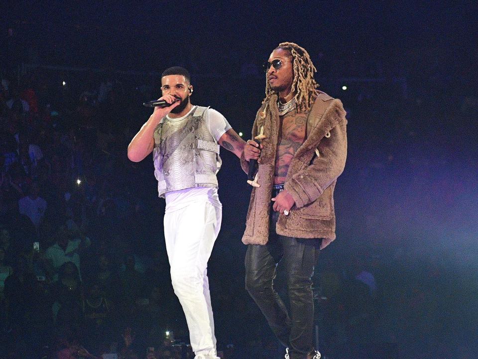 Drake and Future performing onstage