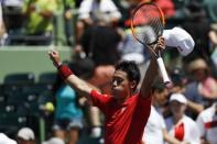 Mar 28, 2017; Miami, FL, USA; Kei Nishikori of Japan celebrates after his match against Federico Delbonis of Argentina (not pictured) on day eight of the 2017 Miami Open at Crandon Park Tennis Center. Mandatory Credit: Geoff Burke-USA TODAY Sports