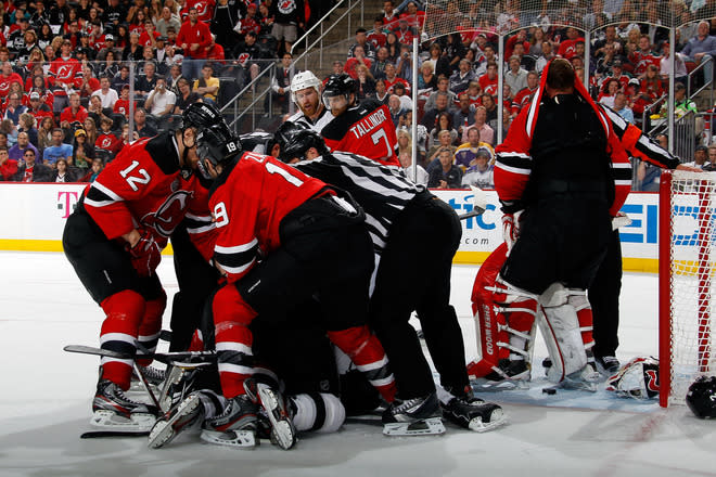 Martin Brodeur #30 Of The New Jersey Devils Has His Jersey Pulled Over His Face As Devils And Los Angeles Kings  Getty Images