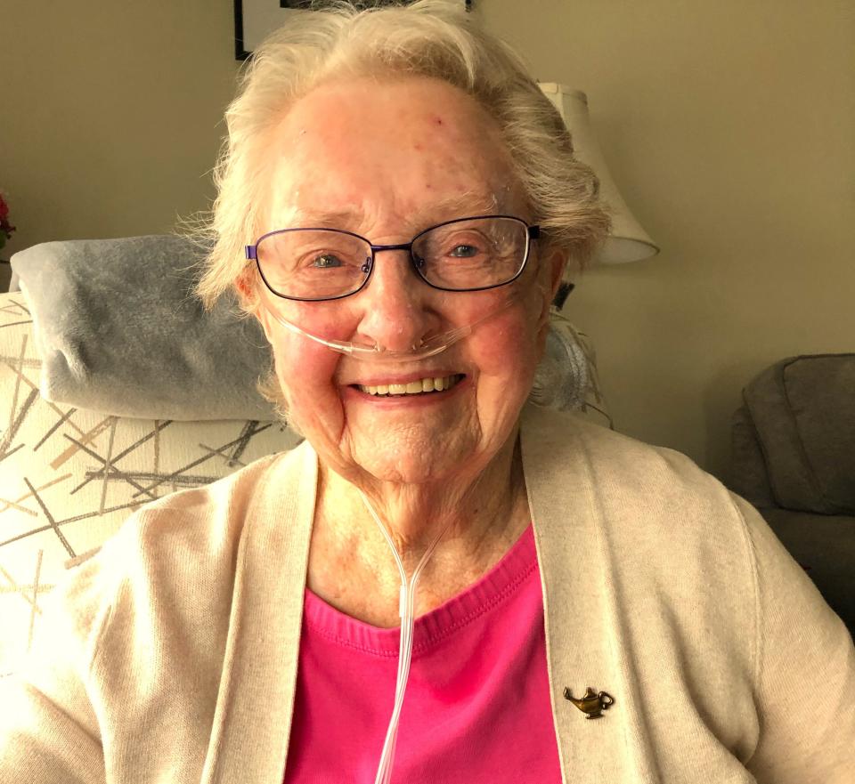 Retired nurse Betty Beecher of Weymouth, 99, with the Nightingale lapel pin showing a lamp, which the NVNA and Hospice presented to her to honor her years of service as a nurse. Beecher is now a patient of the NVNA and Hospice.