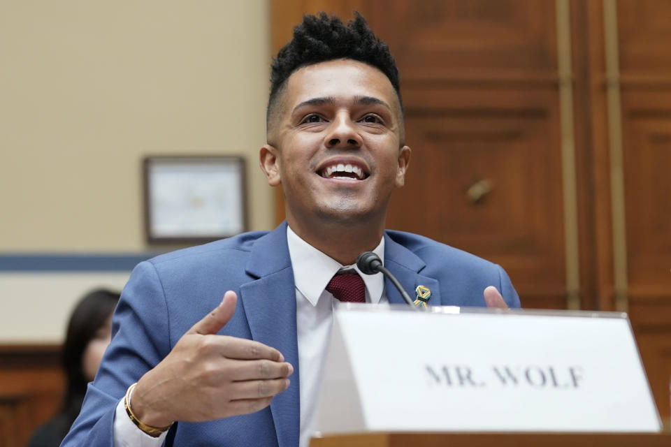 Brandon Wolf, survivor of the Pulse Nightclub Shooting, testifies before a House Oversight Committee hearing, Wednesday, Dec. 14, 2022, on Capitol Hill in Washington. (AP Photo/Mariam Zuhaib)