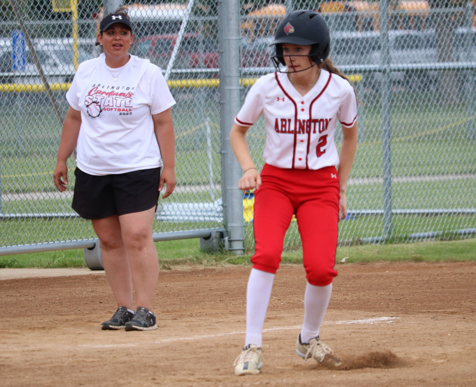 Arlington's Brenley Goebel, shown with head coach DeDe Schmidt, earned Class B all-tournament honors for an Arlington team that finished third in the South Dakota state Class B high school softball tournament in 2023. The senior shortstop is one of the top returnees for the Cardinals this spring.