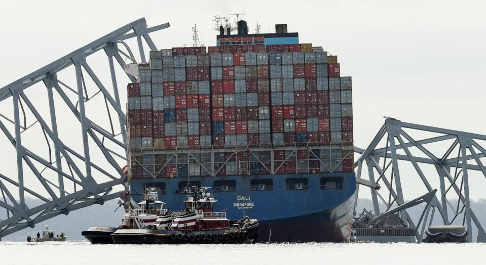 PHOTO: The cargo ship Dali sits in the water after running into and collapsing the Francis Scott Key Bridge on March 26, 2024 in Baltimore, Md. (Kevin Dietsch/Getty Images)