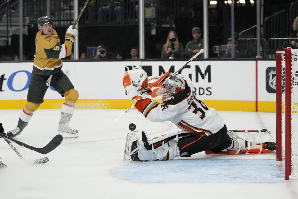 Anaheim Ducks goaltender John Gibson (36) blocks a shot by Vegas Golden Knights center Jack Eichel (9) during the second period of an NHL hockey game Saturday, Oct. 14, 2023, in Las Vegas. (AP Photo/John Locher)