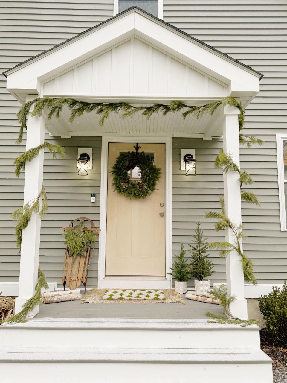 A holiday porch design by SouthCoast Pumpkin Co.