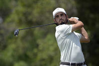 Abraham Ancer, of Mexico, watches his tee shot on the fifth hole during the final round of the Valspar Championship golf tournament, Sunday, May 2, 2021, in Palm Harbor, Fla. (AP Photo/Phelan M. Ebenhack)