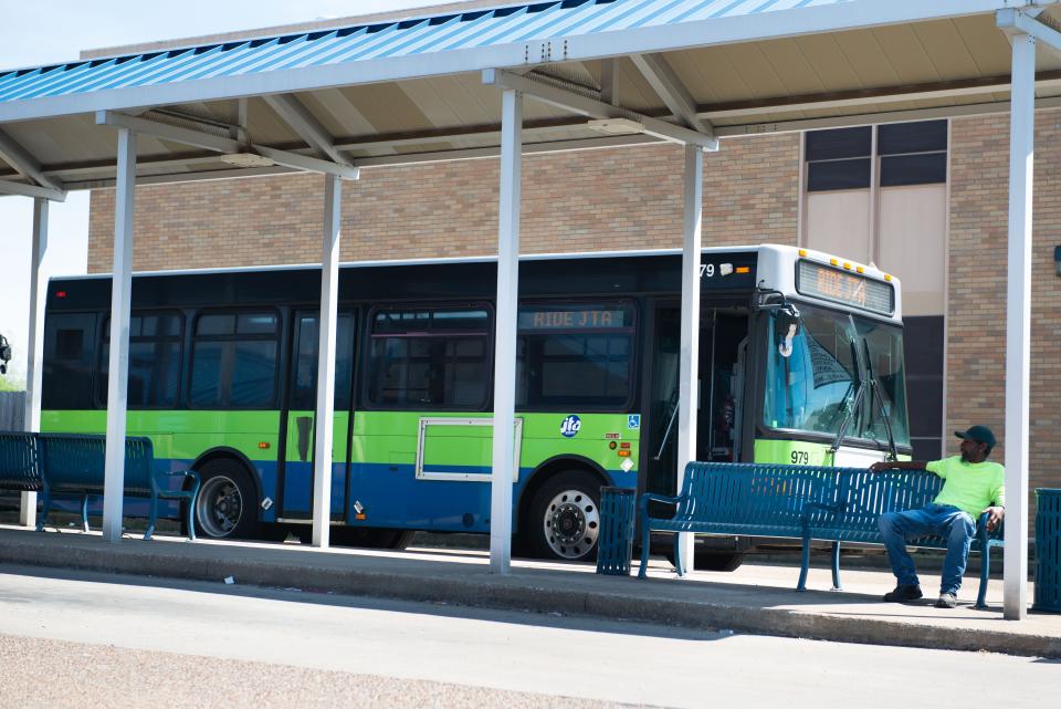 A rider waits for his bus at the JTA Transfer Center in Jackson, Tenn. on Wednesday, Apr. 19, 2023. 