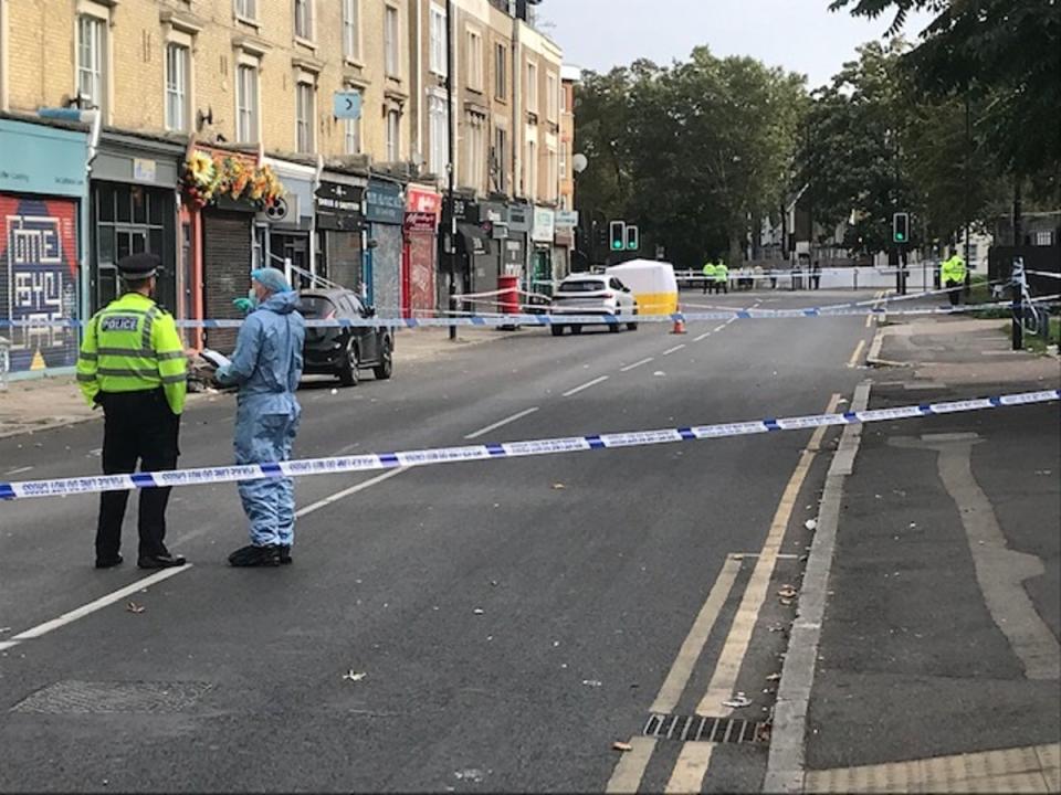 Forensics & police officers at the scene (John Dunne)