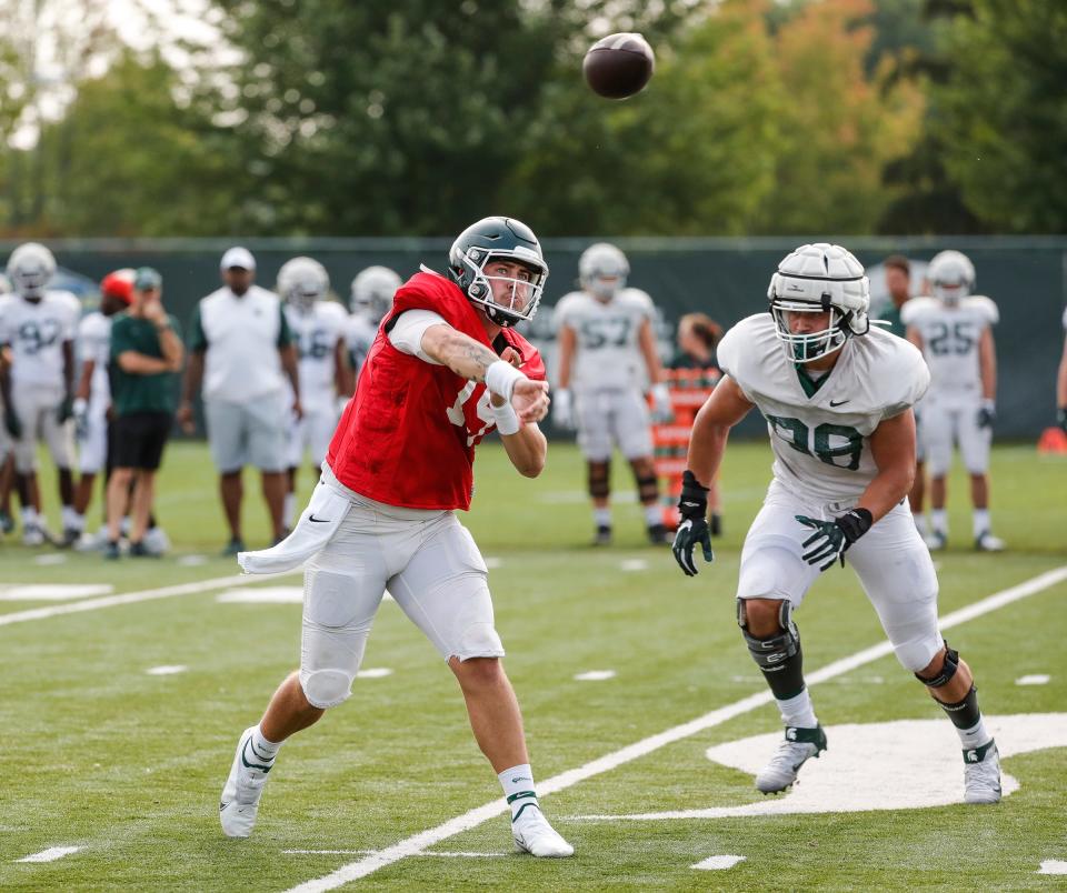 Michigan State quarterback Anthony Russo (15) makes a pass during practice Wednesday, Aug. 11, 2021 at the team's facility in East Lansing.