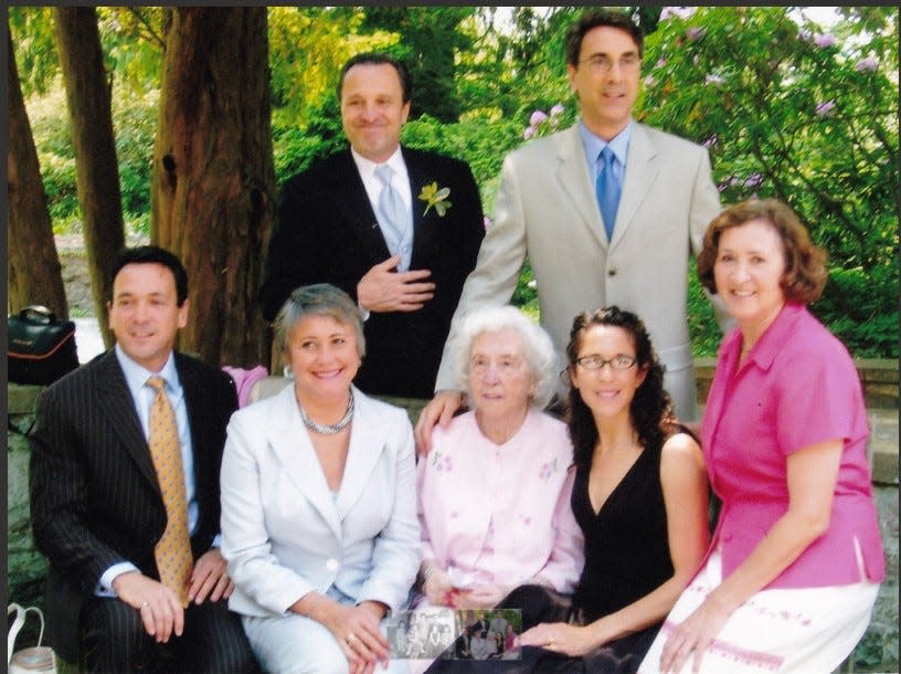 Genevieve Porro with her six children at a grandchild's wedding around 2009.