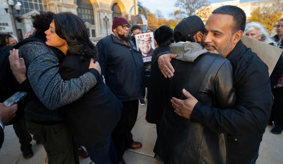 Maribel and Jose Acevedo embrace supporters after a jury acquitted former Milwaukee police officer Michael Mattioni in the death of their son Friday, November 10, 2023 at the Milwaukee County Courthouse in Milwaukee, Wisconsin. Mattioli was found not guilty Friday in the 2020 death of Joel Acevedo.